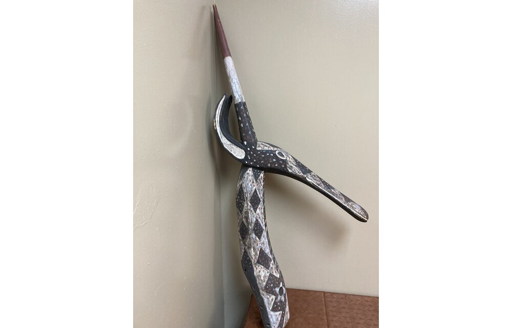 Kurumba Antelope: This graceful figure is actually handheld during both birth celebrations and funerals. The Kurumba are found in northern Burkina Faso. 35 ⅞” tall x 14 ¼” deep