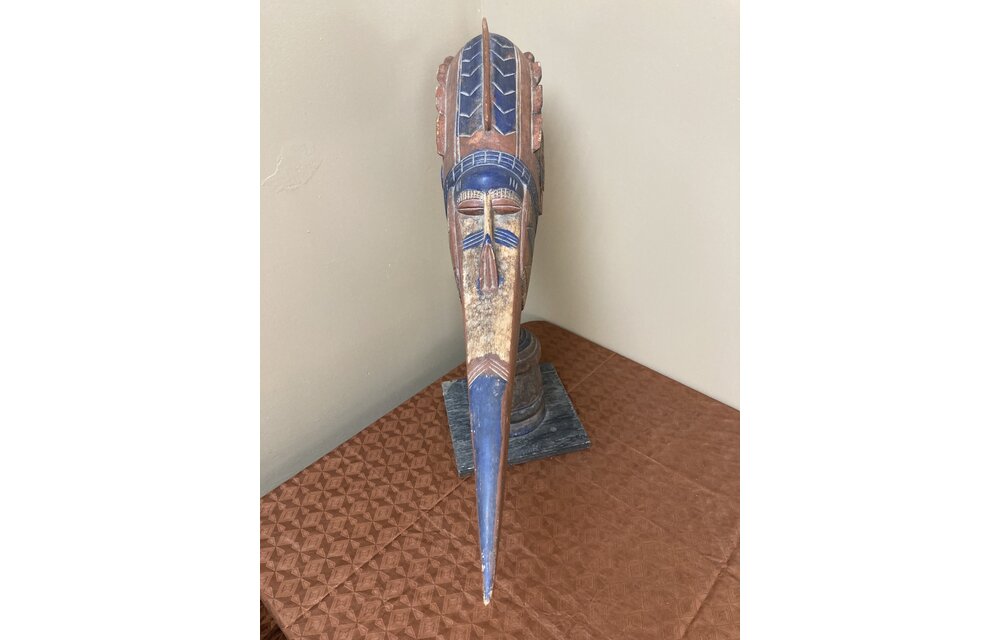 Baga people’s “Etiol” figure that represents the protective spirit of their Simo men’s secret society. The Baga live on the Atlantic Coast of Guinea. Wood’ 25 ¼” H x 33 ½” long.