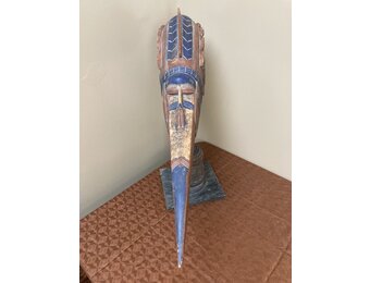 Baga people’s “Etiol” figure that represents the protective spirit of their Simo men’s secret society. The Baga live on the Atlantic Coast of Guinea. Wood’ 25 ¼” H x 33 ½” long.