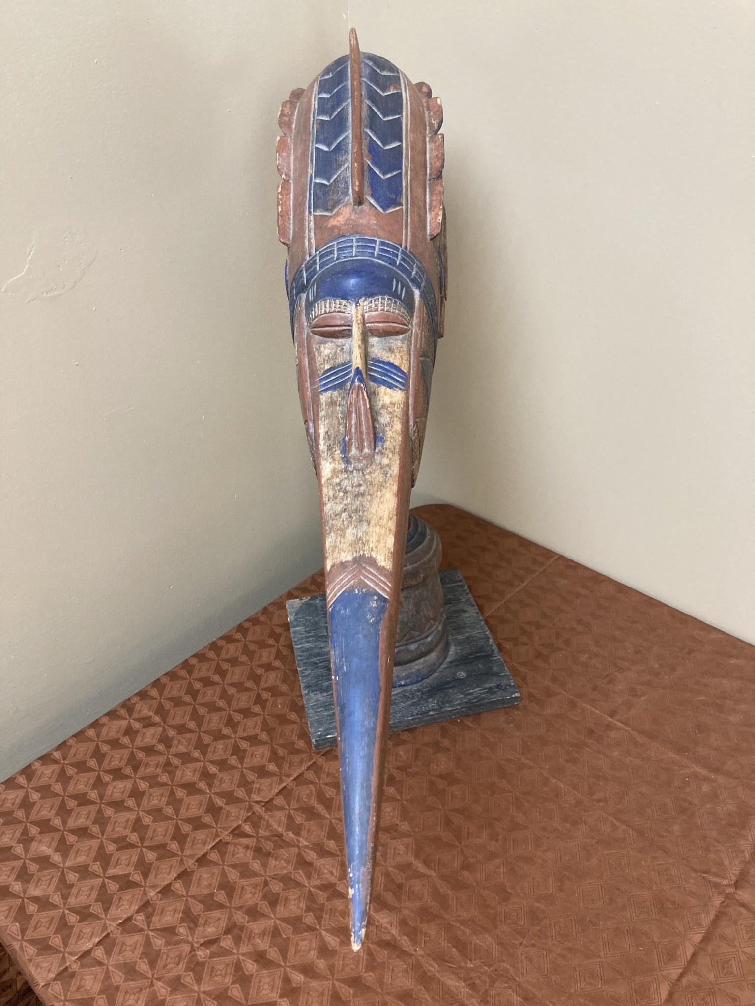 Baga people’s “Etiol” figure that represents the protective spirit of their Simo men’s secret society. The Baga live on the Atlantic Coast of Guinea. Wood’ 25 ¼” H x 33 ½” long.