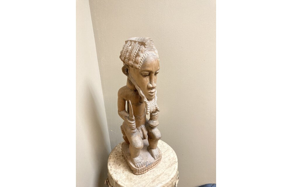 Baule figure from the colonial period. 18 ⅜” tall and 6 ⅛” deep. Ivory Coast.