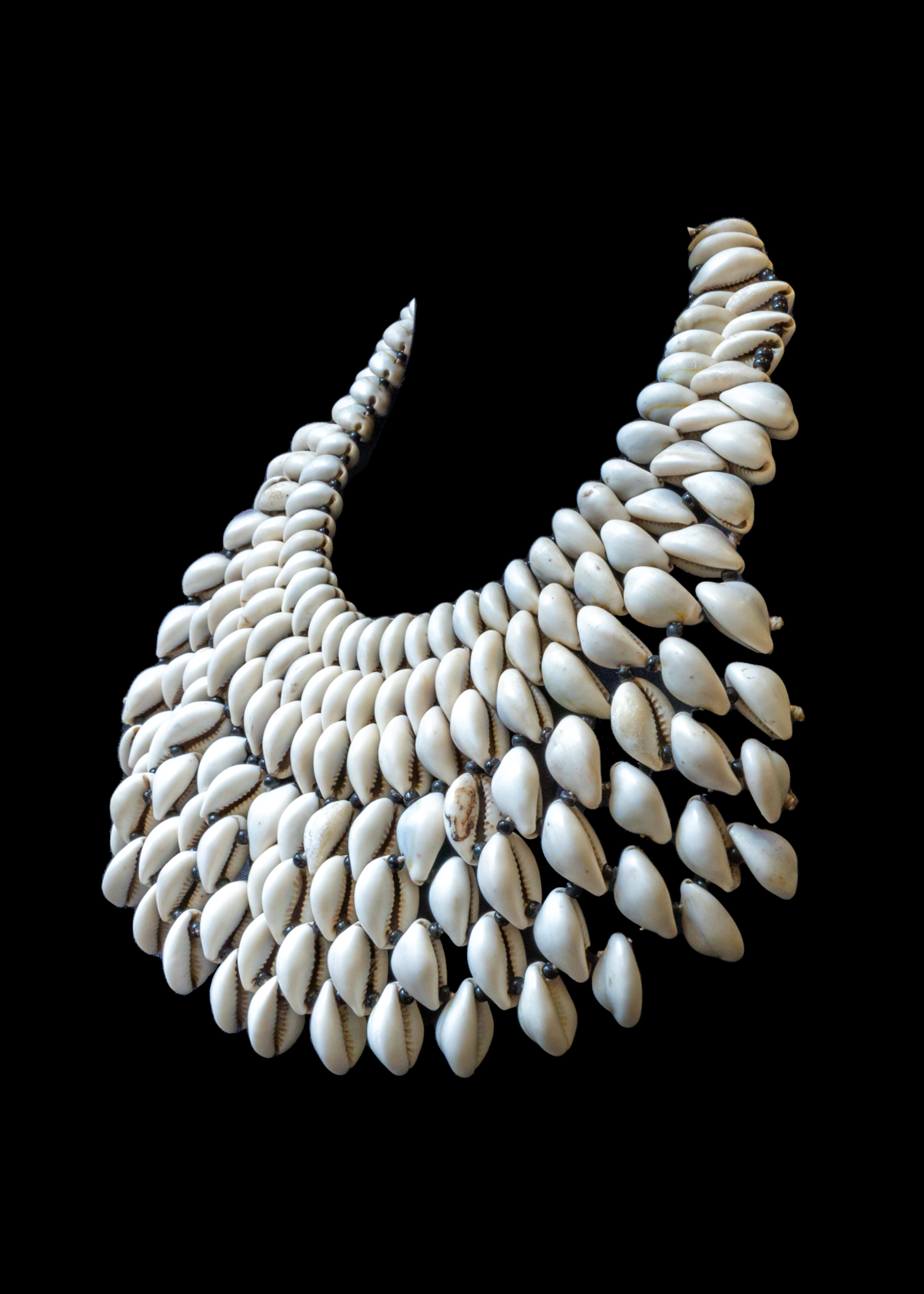 Strand of Carved Shell Bead Caps from Mali