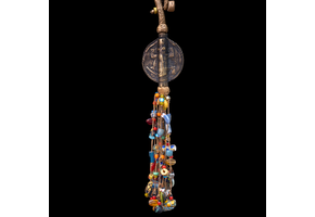 Extra long braided leather necklace adorned with brass and antique multi-colored wedding beads pendant.