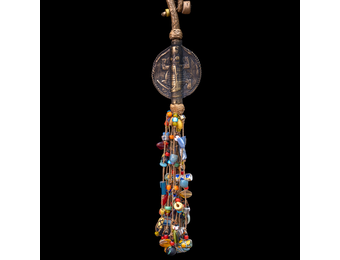 Extra long braided leather necklace adorned with brass and antique multi-colored wedding beads pendant.