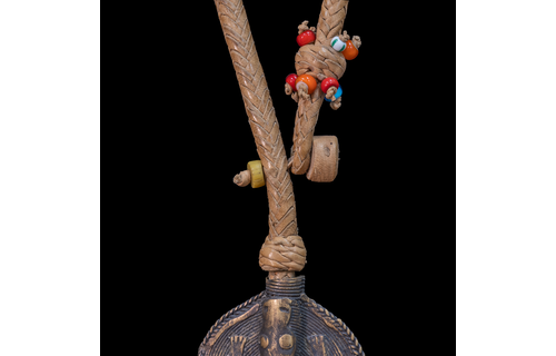 Extra long braided leather necklace adorned with brass and antique multi-colored wedding beads pendant.