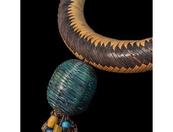 Braided leather necklace/choker adorned with antique multi-colored wedding beads.