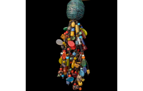 Braided leather necklace/choker adorned with antique multi-colored wedding beads.