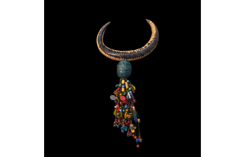 Braided leather necklace/choker adorned with antique multi-colored wedding beads.