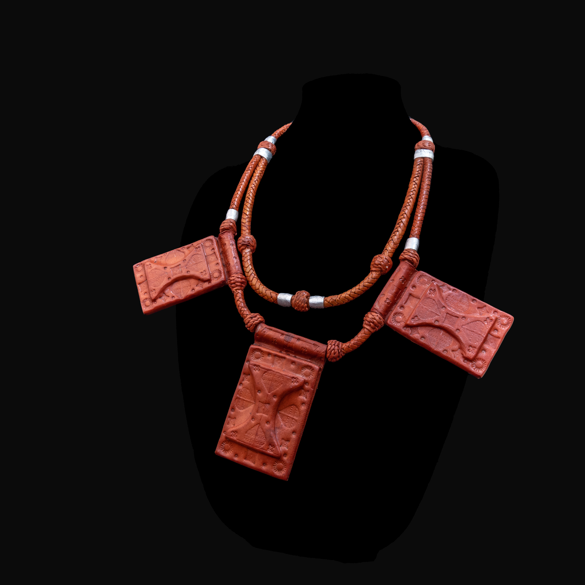 2-layered roped leather necklace with silver metal inserts.