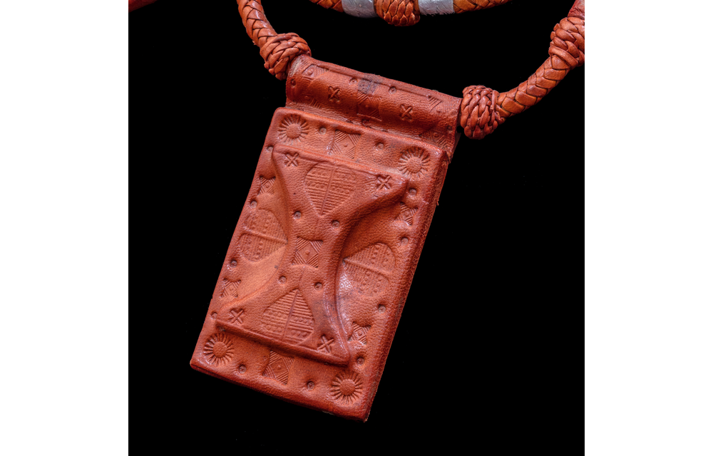 2-layered roped leather necklace with silver metal inserts.