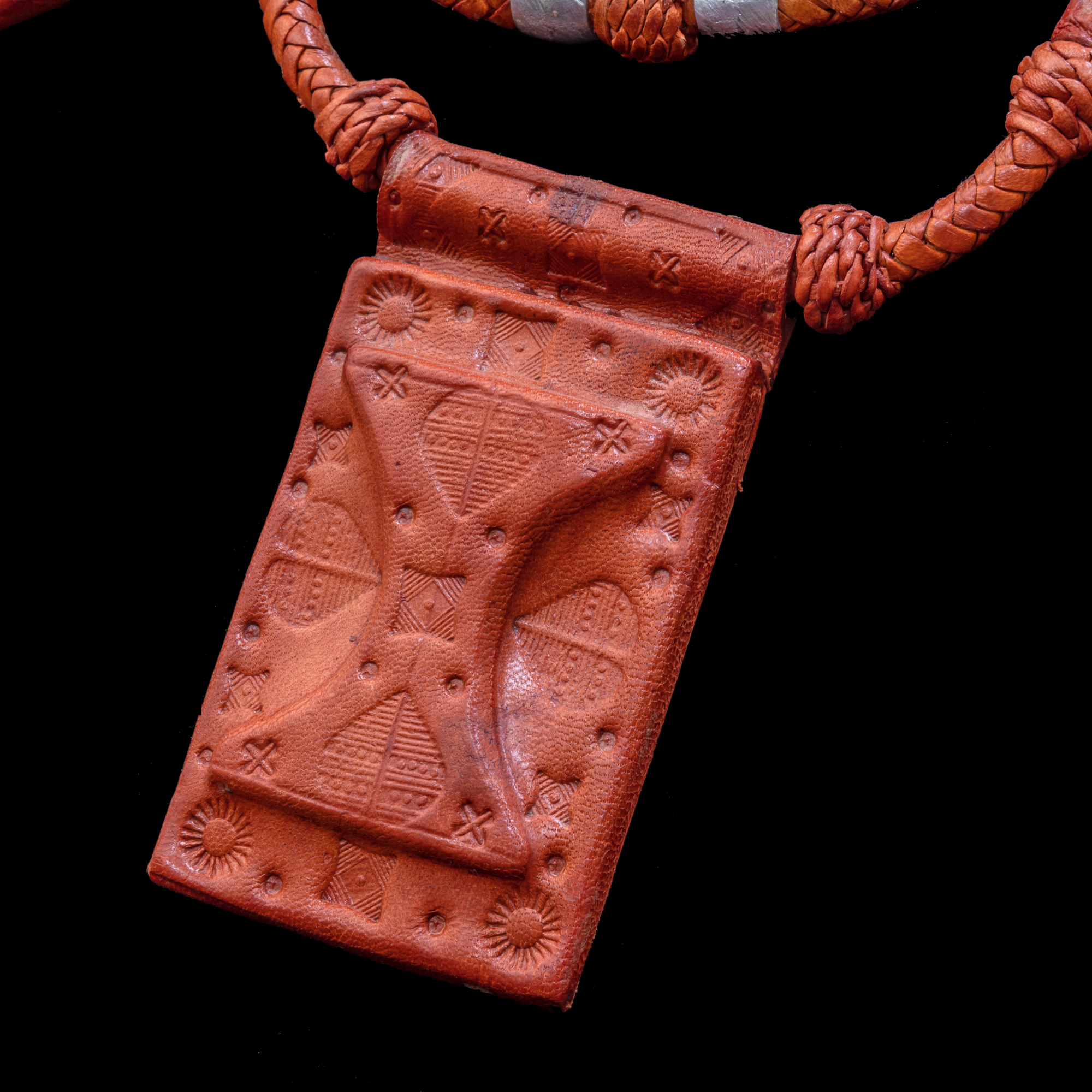 2-layered roped leather necklace with silver metal inserts.