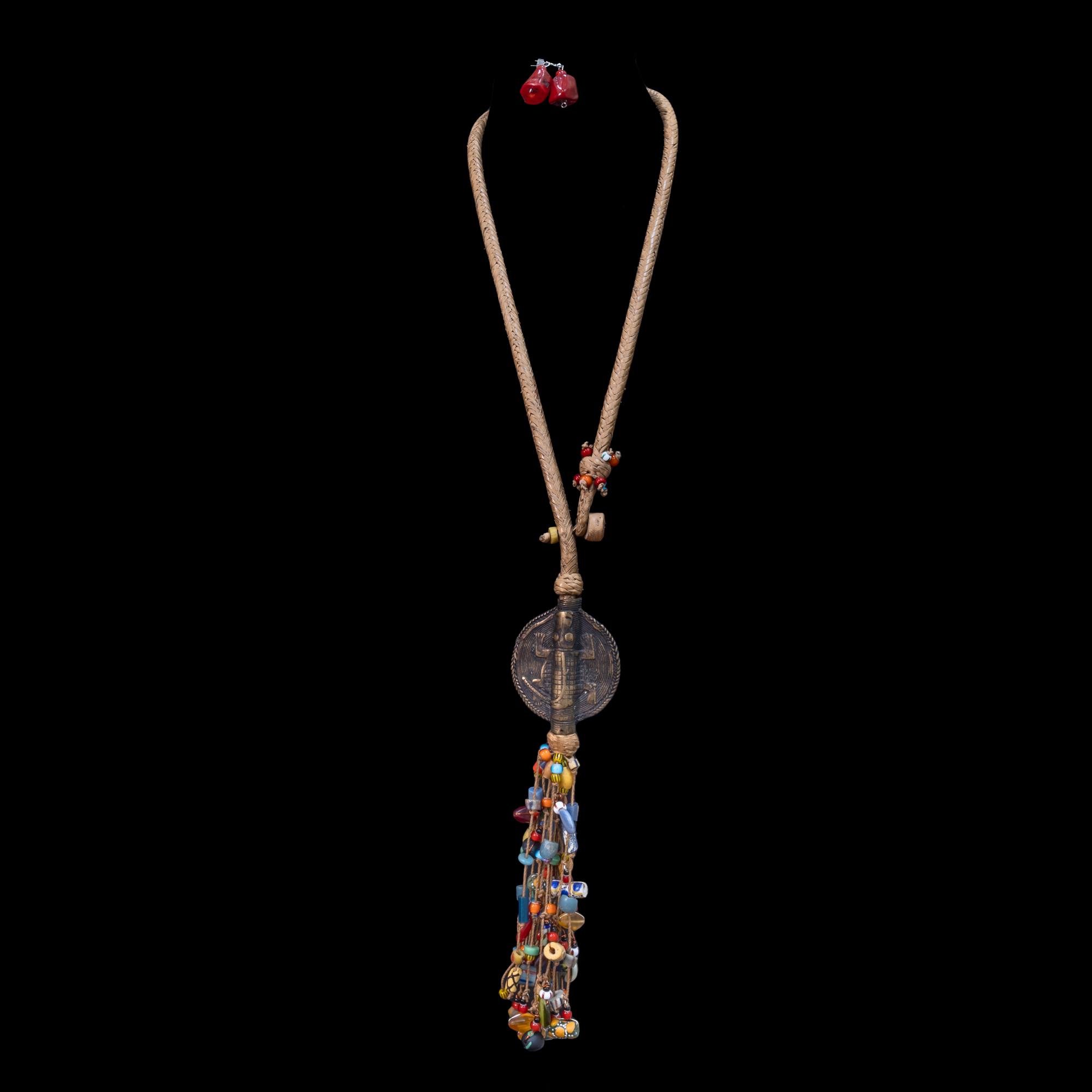 Extra long braided leather necklace adorned with brass and antique multi-colored wedding beads pendant.