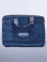 Mali Cotton Indigo bag with leather trim and straps. Measures 14 x 9.5” Suitable for laptops.