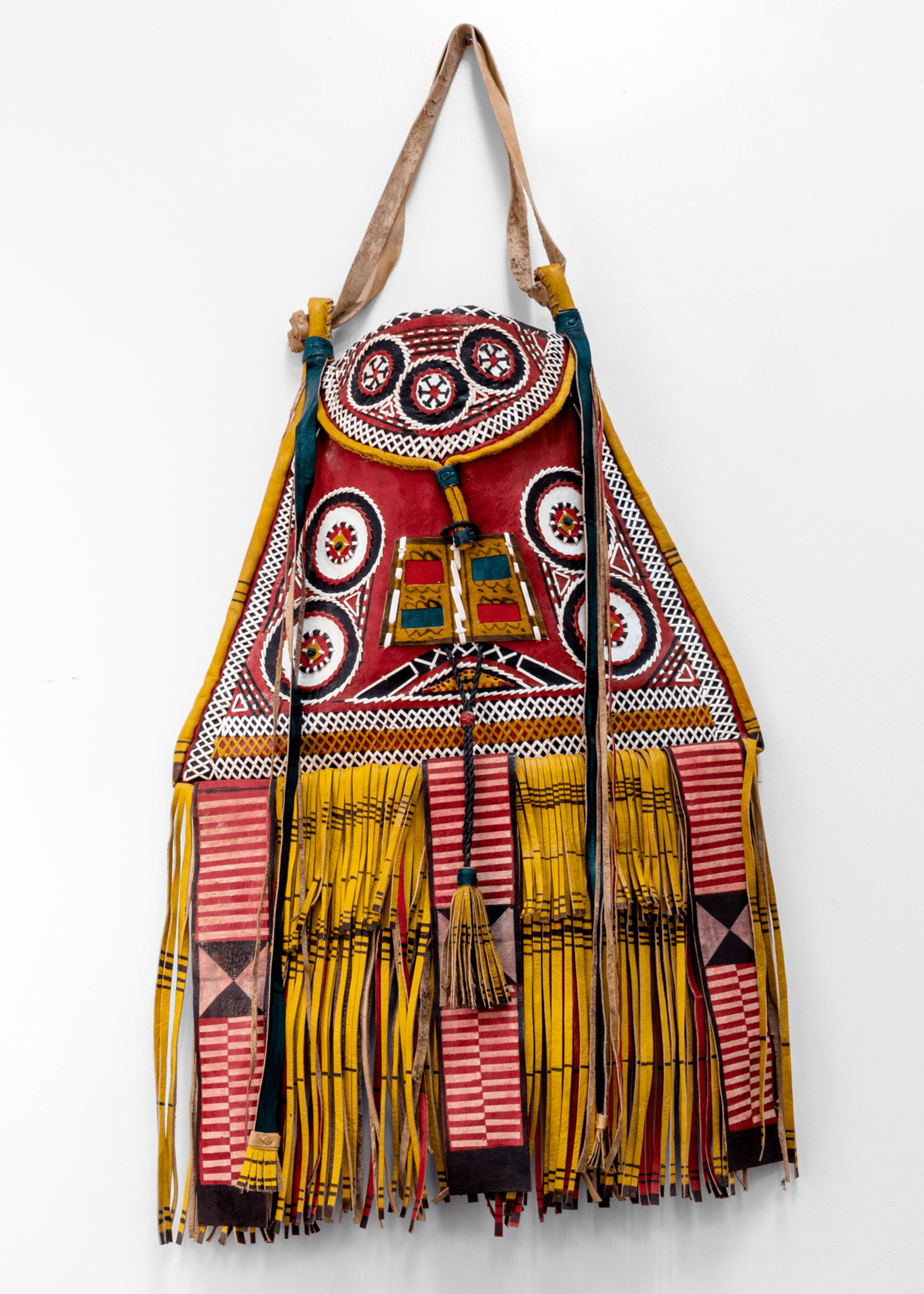 Mali Modern take on traditional Tuareg camel leather bag. Ornate and colorful hand-made  leather bag with fringes.