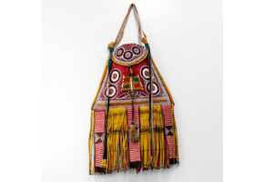 Modern take on traditional Tuareg camel leather bag. Ornate and colorful hand-made  leather bag with fringes.