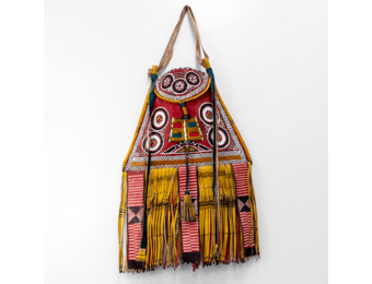 Modern take on traditional Tuareg camel leather bag. Ornate and colorful hand-made  leather bag with fringes.
