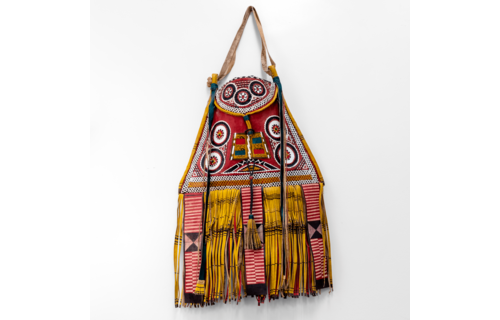 Modern take on traditional Tuareg camel leather bag. Ornate and colorful hand-made  leather bag with fringes.