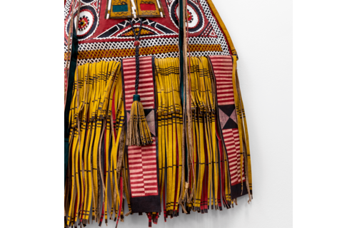 Modern take on traditional Tuareg camel leather bag. Ornate and colorful hand-made  leather bag with fringes.
