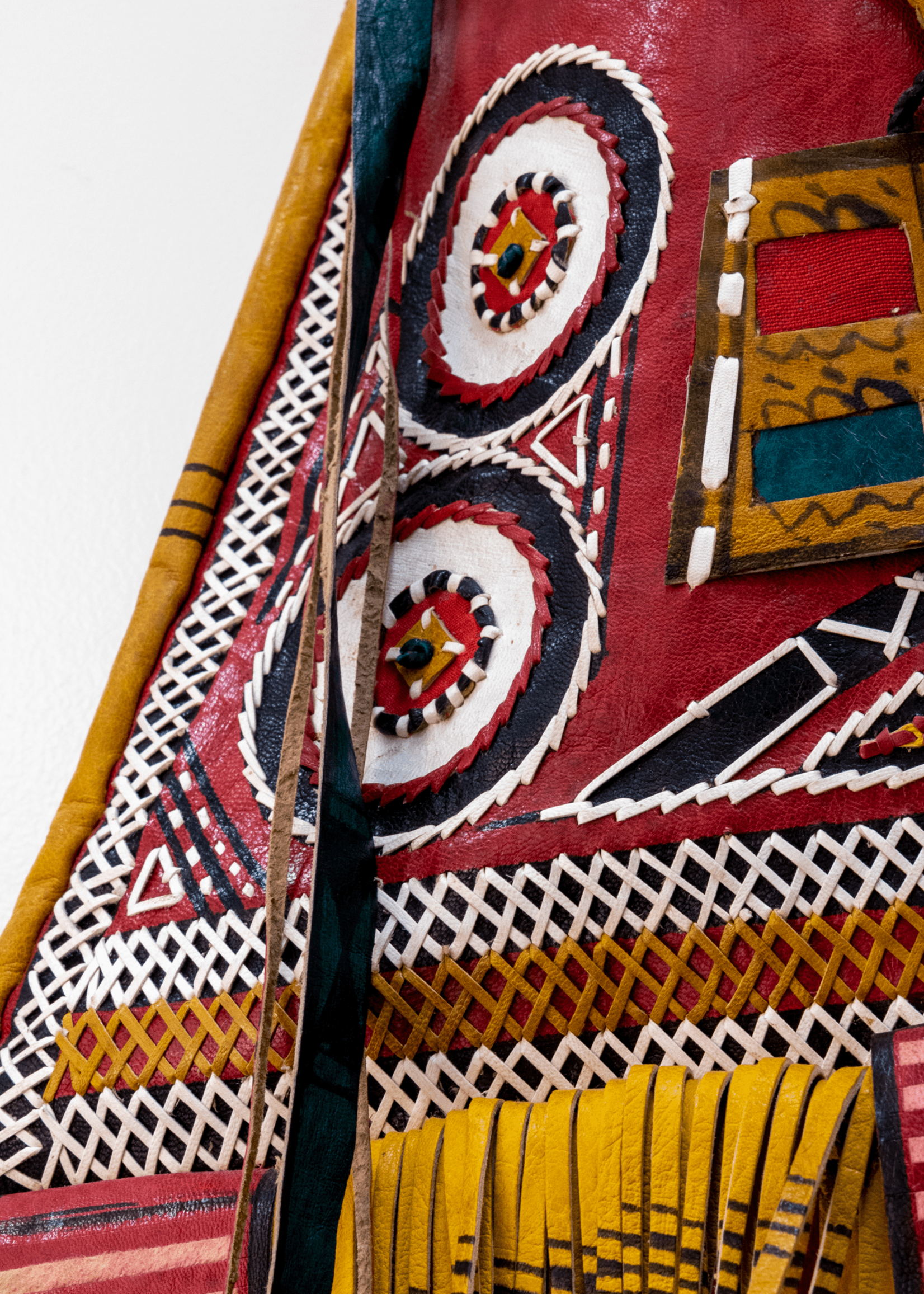 Mali Modern take on traditional Tuareg camel leather bag. Ornate and colorful hand-made  leather bag with fringes.