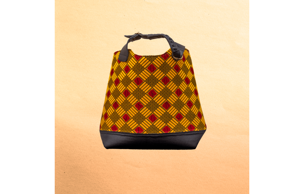 Large Ankara/canvas travel bag. Top zipper. Straps. Measures 21”x 10”