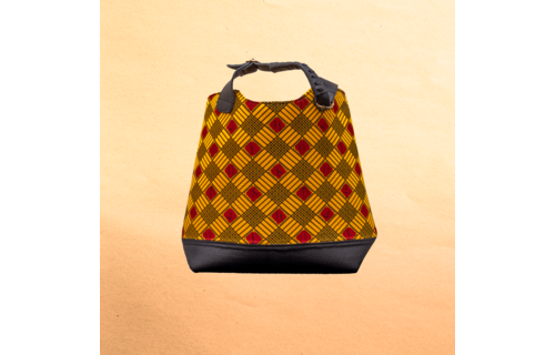 Large Ankara/canvas travel bag. Top zipper. Straps. Measures 21”x 10”