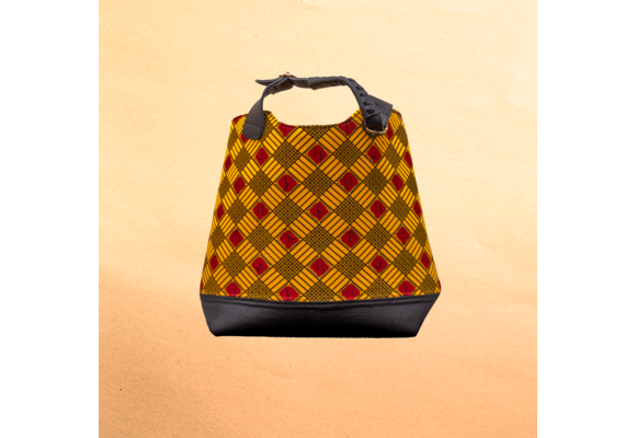 Large Ankara/canvas travel bag. Top zipper. Straps. Measures 21”x 10”