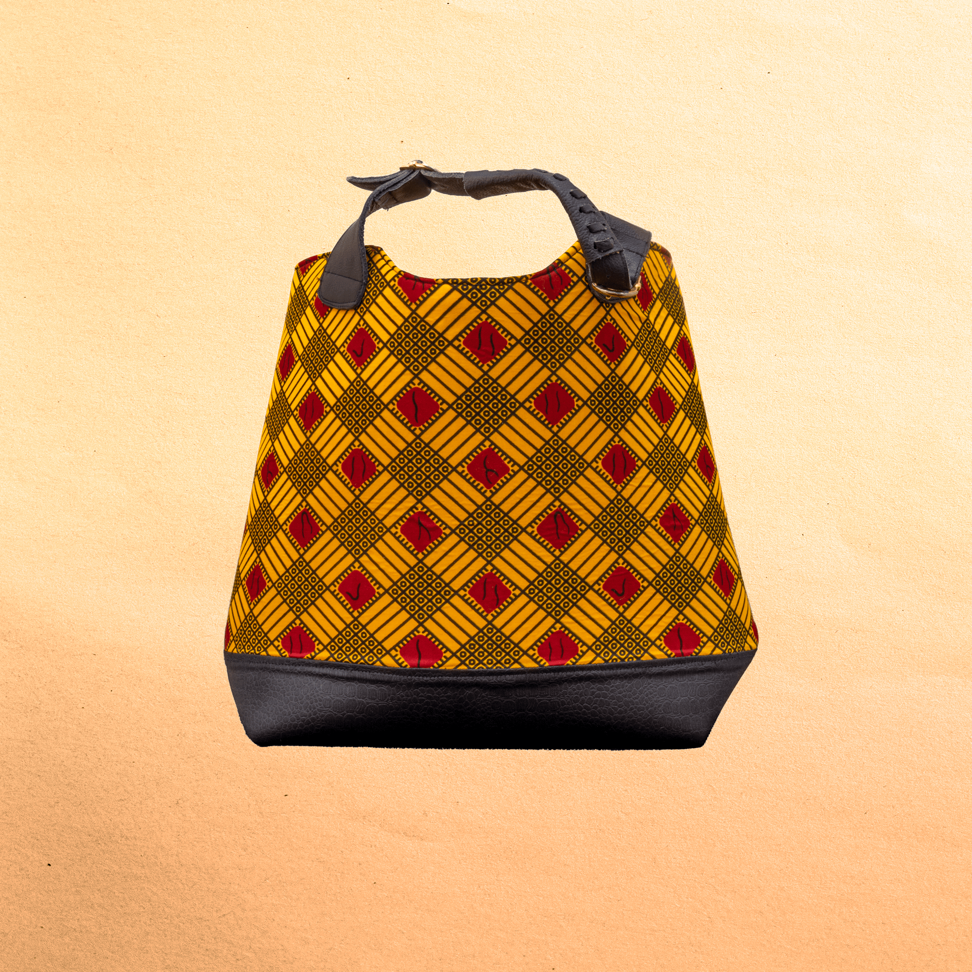 Large Ankara/canvas travel bag. Top zipper. Straps. Measures 21”x 10”