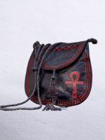 Mali Beautiful cross-body leather bag. Has braided leather straps with Ankh adornment. Inside and outside pockets.