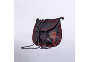Beautiful cross-body leather bag. Has braided leather straps with Ankh adornment. Inside and outside pockets.