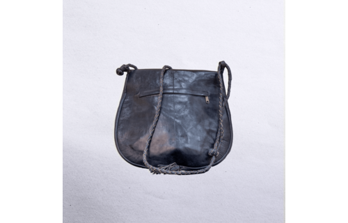Beautiful cross-body leather bag. Has braided leather straps with Ankh adornment. Inside and outside pockets.