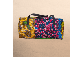 All Ankara overnight travel bag. All your stuff in one place! Top zipper. Measures 21” x 10”