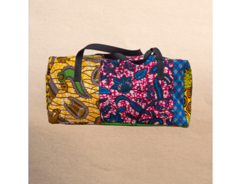 All Ankara overnight travel bag. All your stuff in one place! Top zipper. Measures 21” x 10”