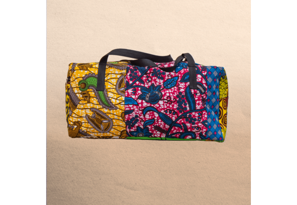 All Ankara overnight travel bag. All your stuff in one place! Top zipper. Measures 21” x 10”