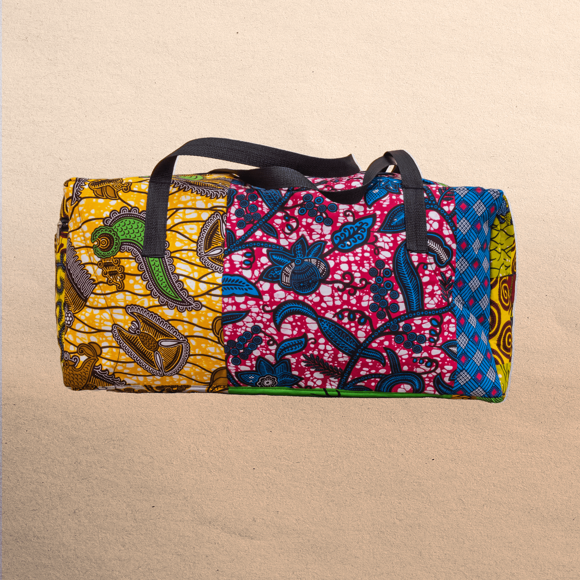 All Ankara overnight travel bag. All your stuff in one place! Top zipper. Measures 21” x 10”