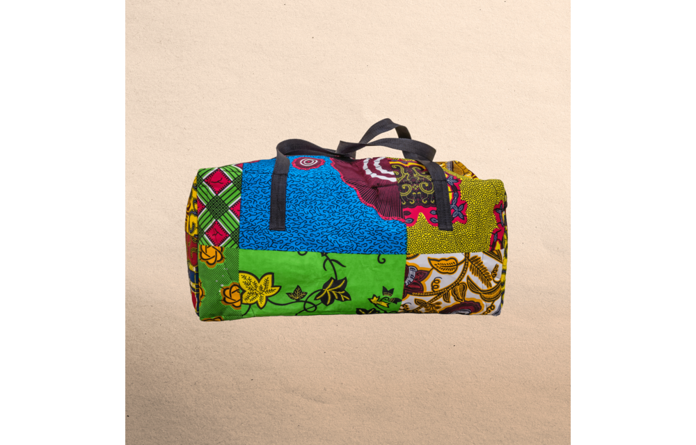 All Ankara overnight travel bag. All your stuff in one place! Top zipper. Measures 21” x 10”