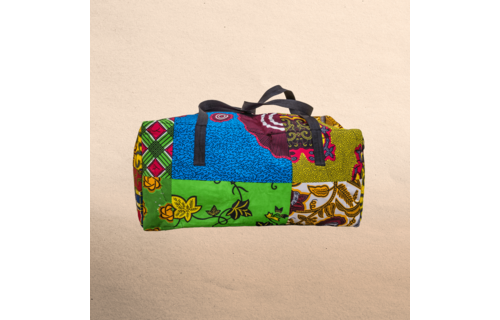 All Ankara overnight travel bag. All your stuff in one place! Top zipper. Measures 21” x 10”