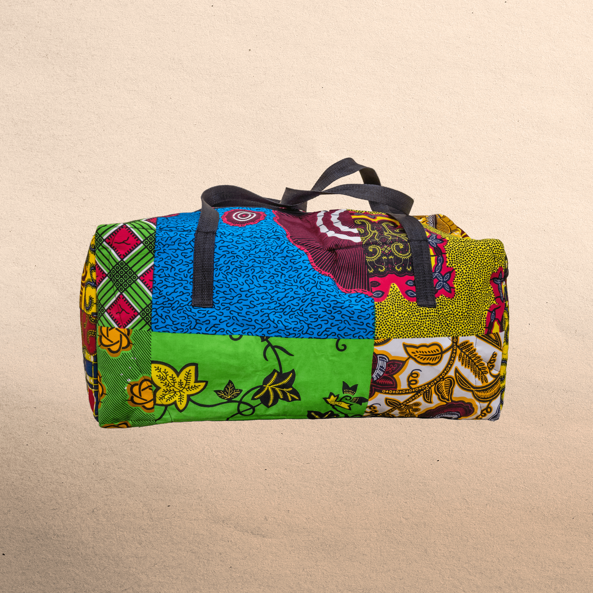 All Ankara overnight travel bag. All your stuff in one place! Top zipper. Measures 21” x 10”