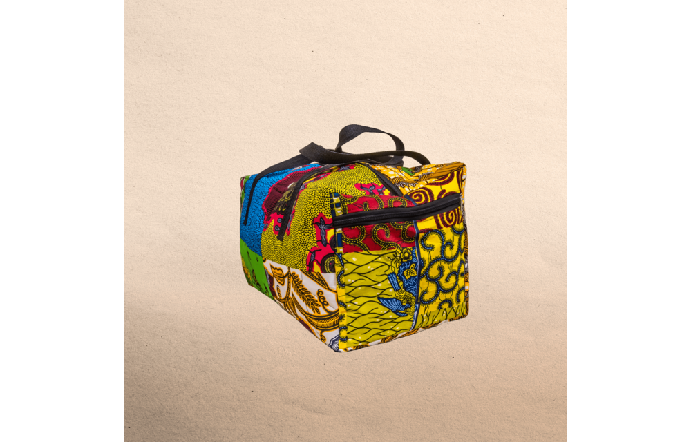 All Ankara overnight travel bag. All your stuff in one place! Top zipper. Measures 21” x 10”
