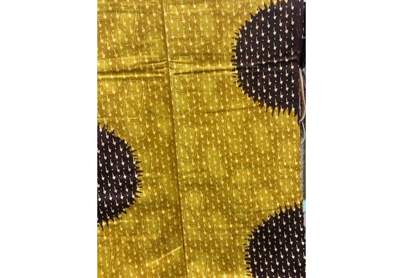 Spots Ankara Print. Sold by full yard only.