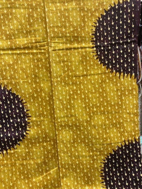 Spots Ankara Print. Sold by full yard only.