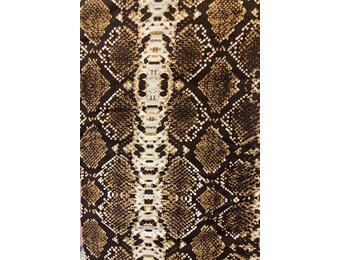 Snakeskin Ankara Print. Sold by full yard only.