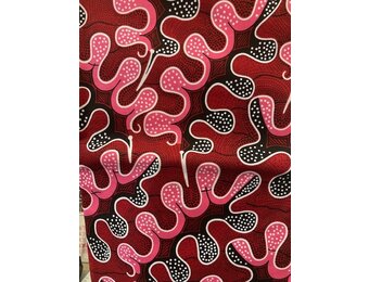 Puzzle Red Ankara Print. Sold by full yard only.