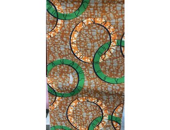 Rings Ankara Print. Sold by full yard only.