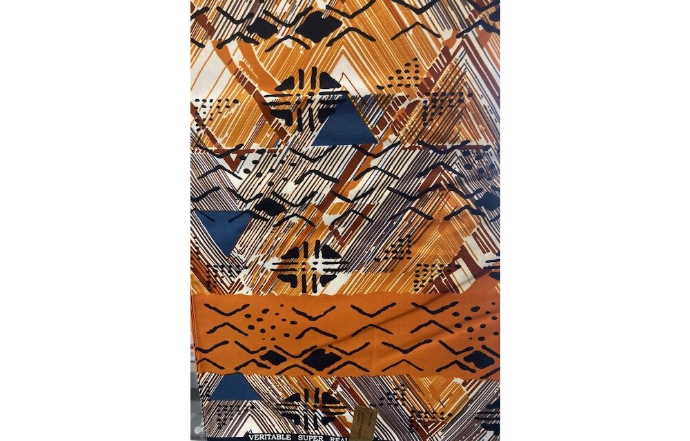 HiTarget Orange Ankara Print. Sold by full yard only.