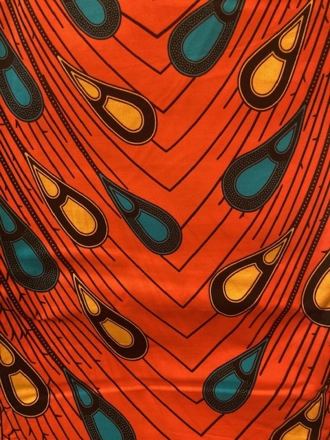 Point Orange Ankara Print. Sold by full yard only.