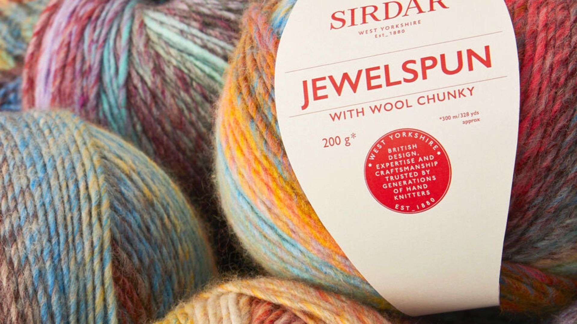 Historic portrait of a Sirdar founder beside vintage yarn-spinning machinery
