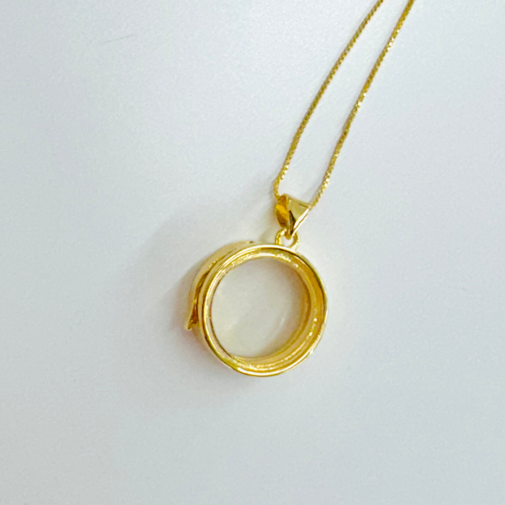 The Crowns Circle Locket