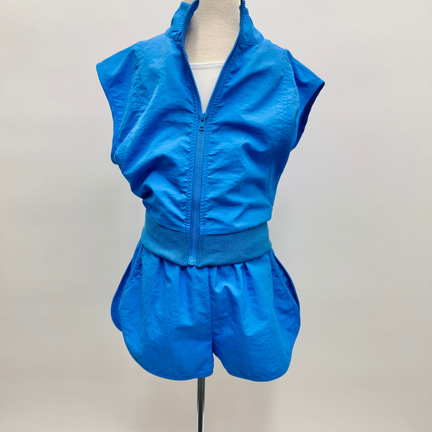 Sadie & Sage Back & Forth Crop Nylon Zip Vest - Blue