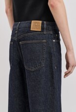 Toteme Twisted seam denim full length