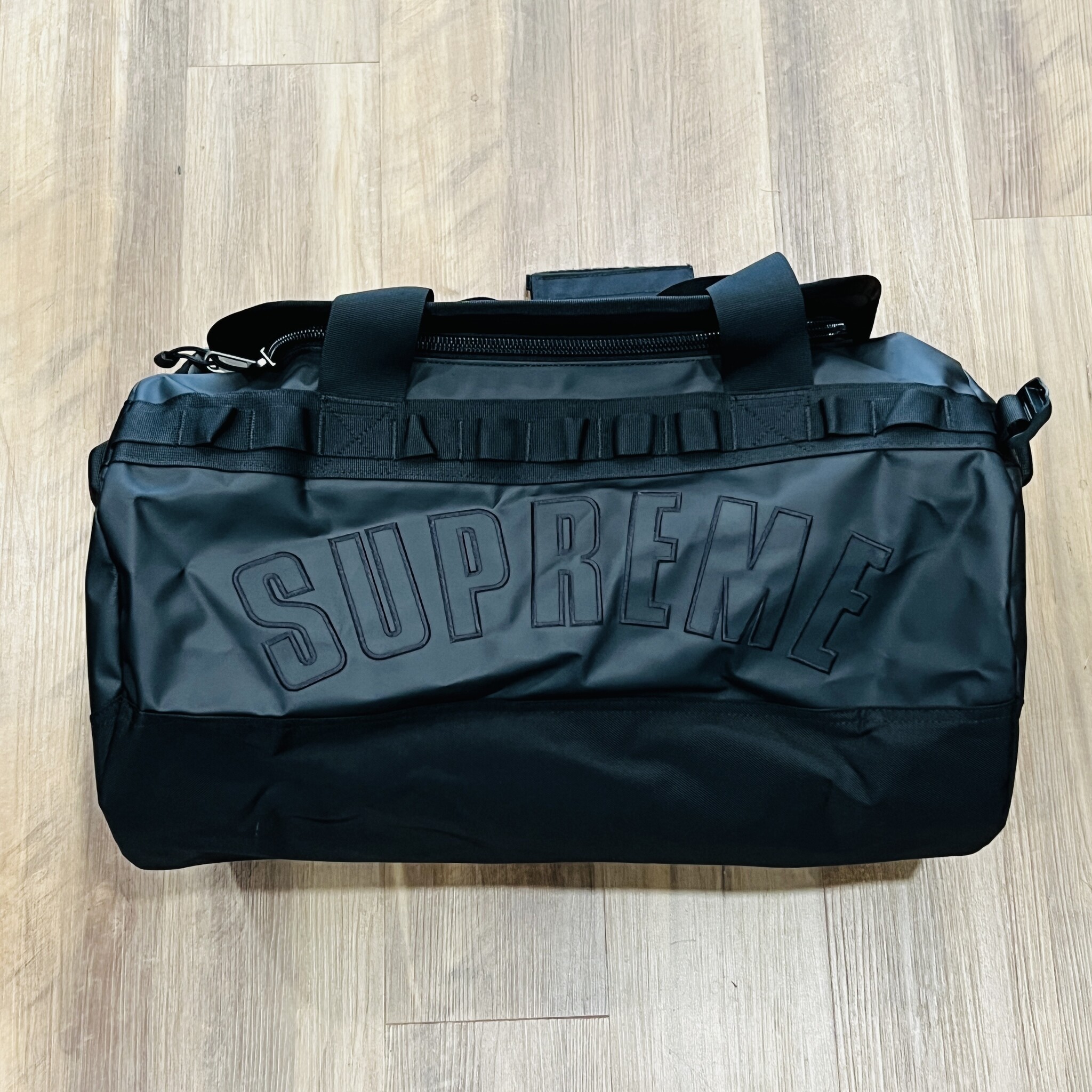 Supreme the north face arc logo small base camp duffle bag best sale
